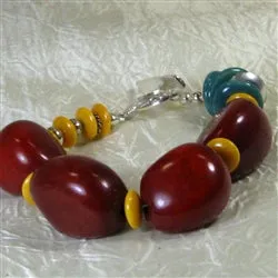 Eclectic Bracelet in Maroon  Tagua nuts and Turquoise Kazuri Beads