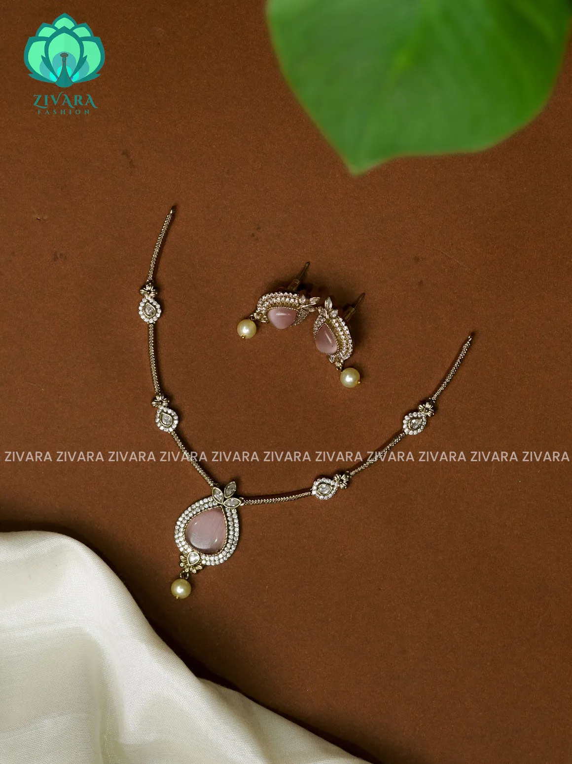 PASTEL PINK SIMPLE SUBTLE GOLD FINISH TEAR PENDANT   - stylish and minimal elegant neckwear with earrings- Zivara FashioN