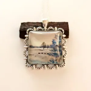 Water color painting on a pendant/Bison in the grass